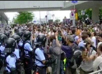 Hong Kong police use tear gas to disperse demonstrators in front of parliament