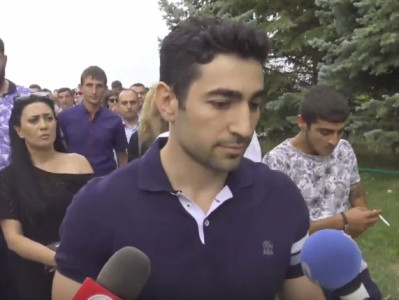 Armenia 2nd President's son visits Yerablur Military Pantheon