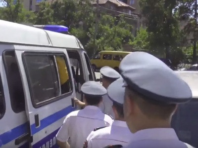One detained from Constitutional Court's yard, another summoned to police