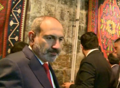 Armenia PM, wife help wounded soldiers weave "Armenian Universe" carpet (VIDEO)