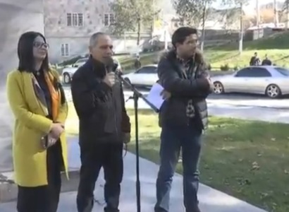 Activists supporting Armenia's ex-president collect signatures in Kapan