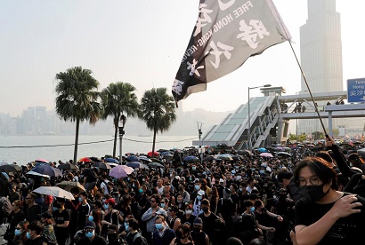 Protests resume in Hong Kong: Protesters flood streets with black flags, thanking Trump