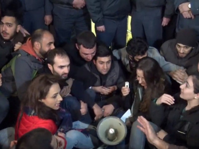 ARF youth sit in front of Armenia education ministry
