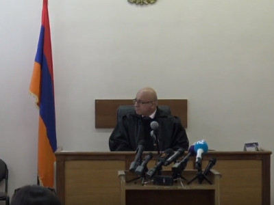 Ex-Armenian army general not present, court postpones trial for half an hour