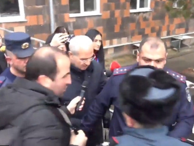 Ex-Armenia minister did not answer reporters questions after first court hearing