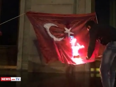 Young Armenians burn Turkish national flag at Liberty Square in Yerevan