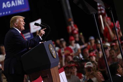 Trump holds indoor campaign rally amid COVID-19 concerns