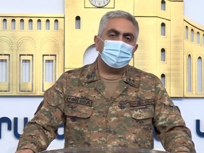 Armenia MOD representative, FM spokesperson giving news conference