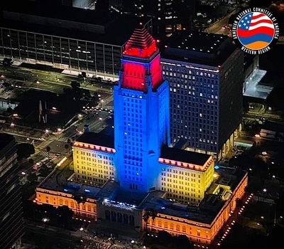 LA city hall building is illuminated with colors of Armenian flag