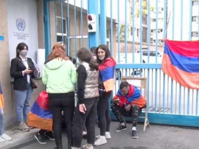 Group of citizens protesting outside UN office in Armenia