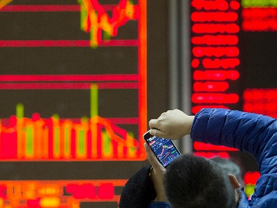 Stock prices in Tokyo rise to record highs since 1990