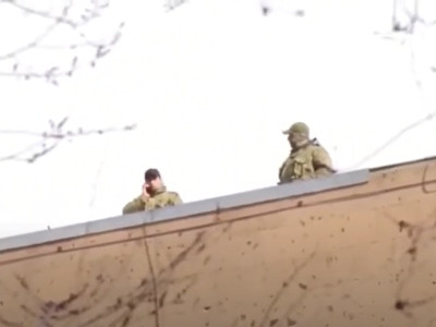 Snipers on Armenia government building rooftop