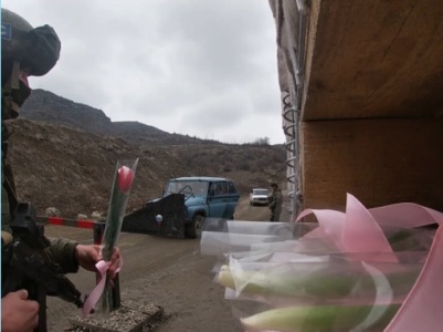 Russia peacekeepers present flowers to Karabakh female residents