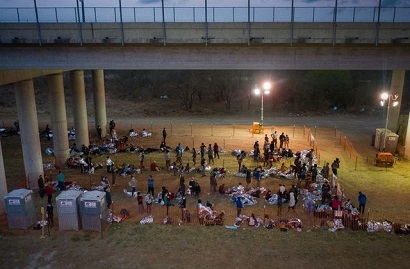 Biden administration seeks solution to crisis over surge of migrant children at US-Mexico border