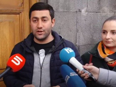 Young members of ARF-D bring Shahan Natali's book "The Turks and Us" for deputies of Armenia ruling party