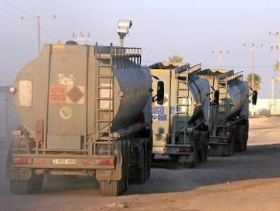 US military removes hundreds of Syrian oil tanks to Iraq