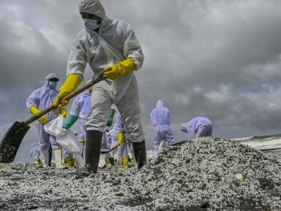 Sri Lanka public beach is covered in charred plastic pellets due to fire in container ship