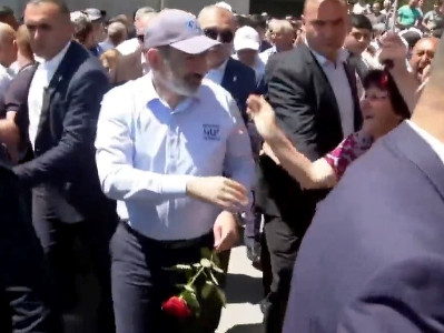Rose petals are sprinkled on Armenia acting PM at Aragatsotn Province village
