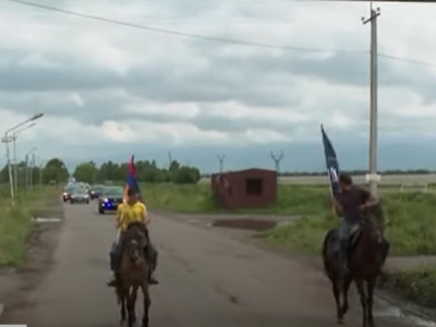 Horsemen lead Armenia acting PM Pashinyan motorcade in Lori Province village