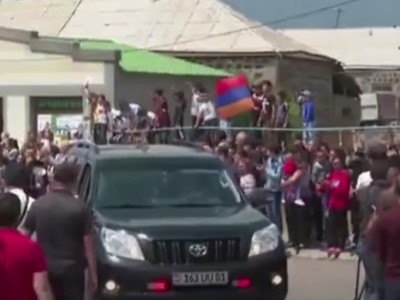 Armenia acting PM supporters give kids instructions in Gegharkunik Province village