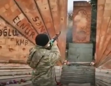 Azerbaijani soldier fires gunshots at Armenian cross-stone in Hadrut (VIDEO)