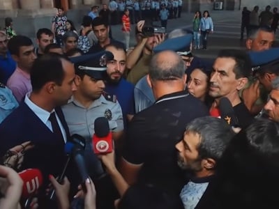 Armenia PM's assistant and daughter of deceased serviceman get into dispute