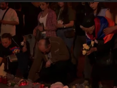 Protesters bring flowers and toys to place where pregnant woman died in Yerevan