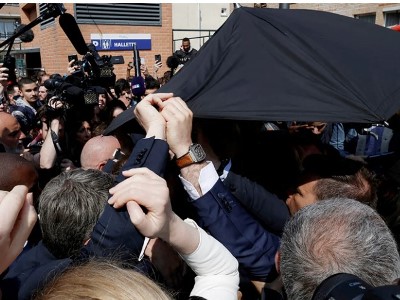 Emmanuel Macron pelted with tomatoes