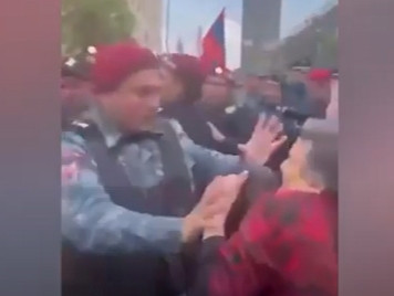 Policeman hits woman during protest action in Yerevan