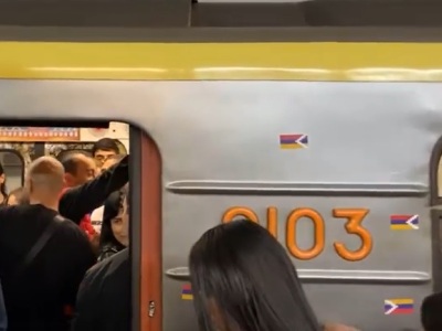 Subway: protesters glued emblems with flag of Artsakh on cars