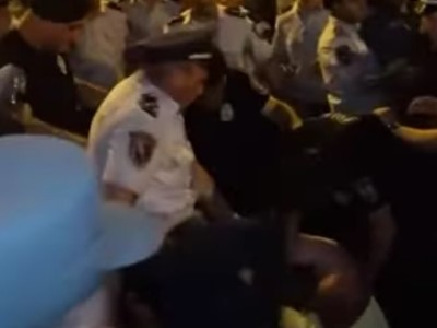 Cameras record how one of police officers hit protester