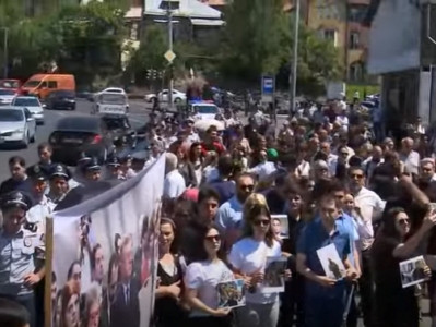 Armenia opposition movement participants marching towards EU office