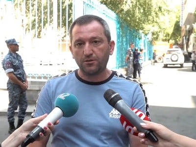 Those displaced from Artsakh due to 44-day war staging protest outside UN Armenia office