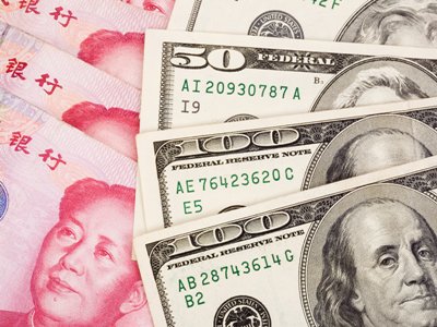 Reuters: Chinese banks sell off dollars to support yuan