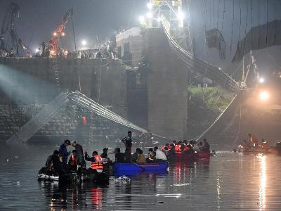 Nine people arrested in India after mass deaths in bridge collapse
