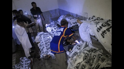 Pakistani Taliban claim responsibility for attack on police headquarters in Karachi