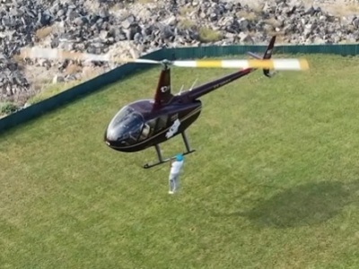 Armenian athlete breaks Guinness world record by doing 32 pull-ups on helicopter skids in 1 minute