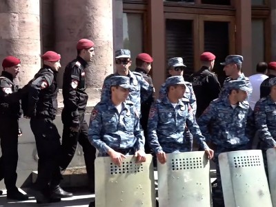 Police, armed with shields, ‘protect’ Armenia government building