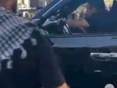 SUV hits trash container, goes through protesters in downtown Yerevan