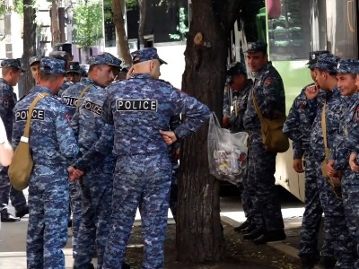 Police are brought to Yerevan Republic Square on buses