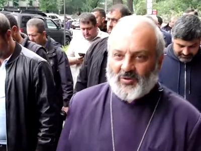 Archbishop Bagrat Galstanyan, supporters march to Yerevan State University courtyard