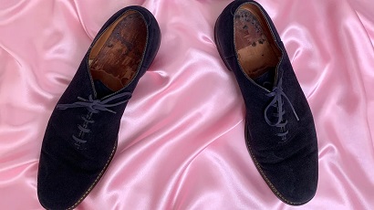 Elvis Presley's famous blue suede shoes sell for more than $150,000 in auction