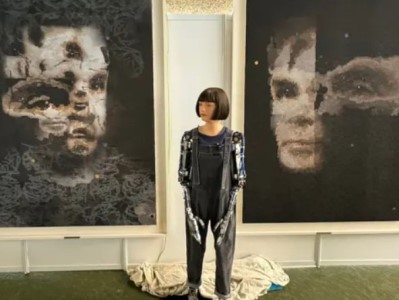 Portrait ‘painted’ by world's first ultra-realistic robot artist to be auctioned at Sotheby's