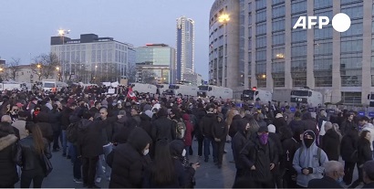 Protesters gather outside the court in Istanbul where Ekrem Imamoglu is due to stand trial