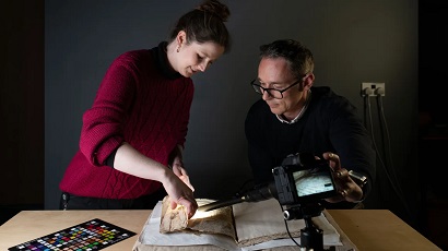 Researchers find rare medieval manuscript with stories of King Arthur hidden under another book cover