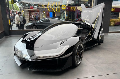 Lotus unveils its new Theory 1, electric concept car with digital glass and ‘grasshopper’ doors
