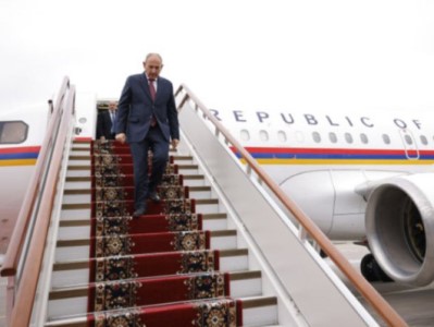 Who heads for Poland with Armenia PM?