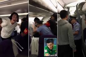 Top Chinese Football Star Li Lei Dragged Off A Plane In HANDCUFFS after cancellation sparks row