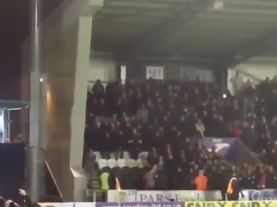Scottish fans play snowball fight during match
