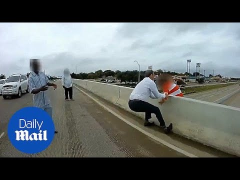 Police, passers-by save man attempting to jump from bridge in US